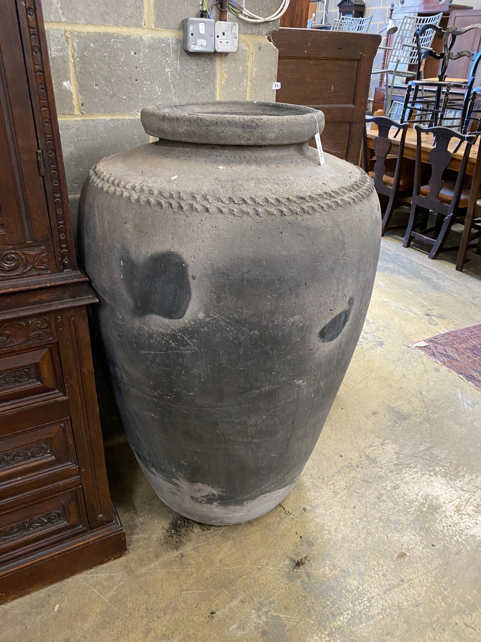 A large Greek style oil jar, height 123cm